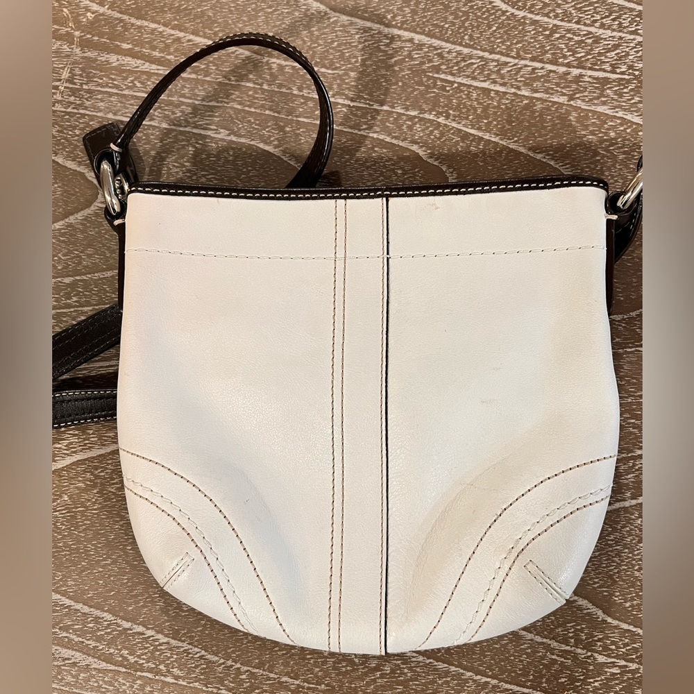 White Coach bag with dark brown strap